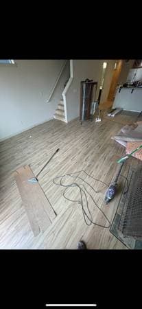 picture of a wood floor in the process of being remodeled